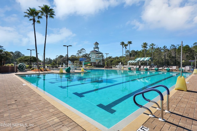 pool with a patio area