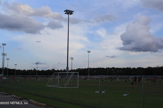 view of community with fence