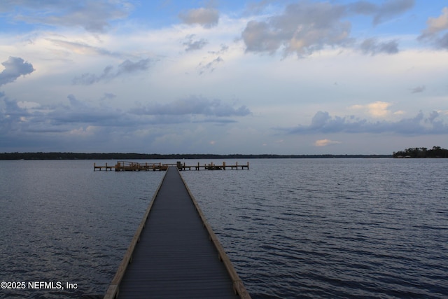 view of dock with a water view