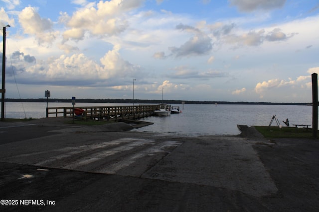 view of dock with a water view