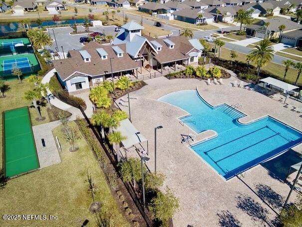 view of pool featuring a residential view