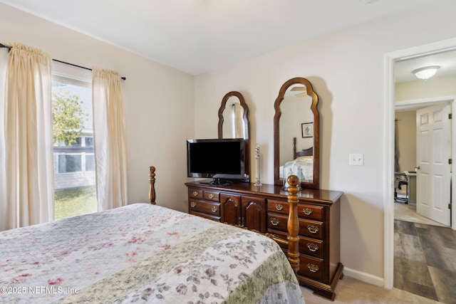 bedroom with baseboards