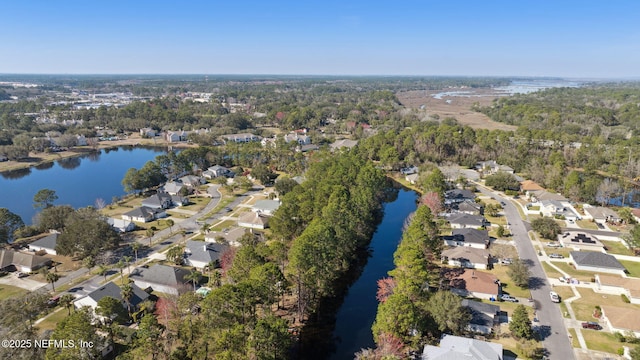 bird's eye view with a residential view and a water view