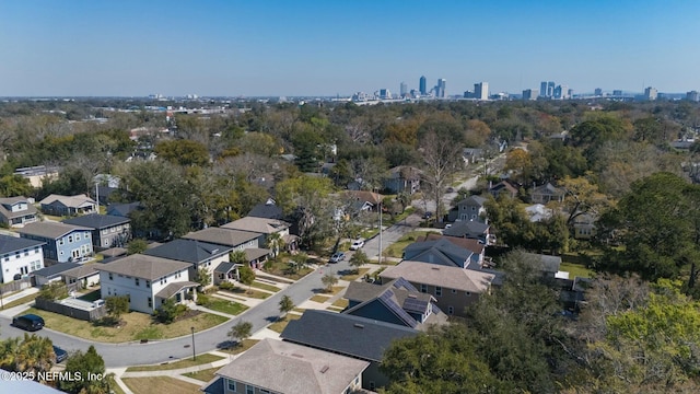 birds eye view of property with a view of city