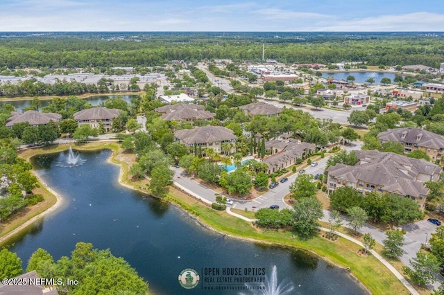 aerial view with a water view and a residential view