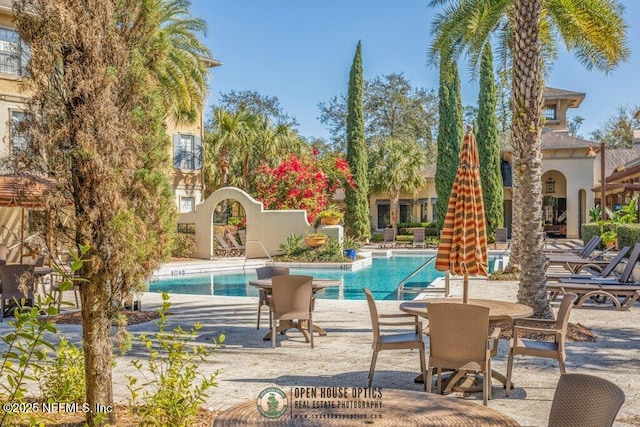 community pool with a patio