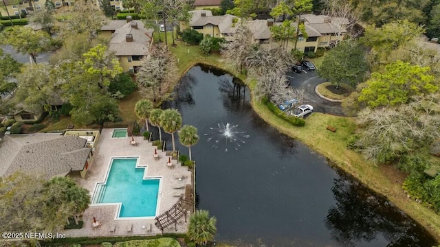 aerial view featuring a residential view and a water view