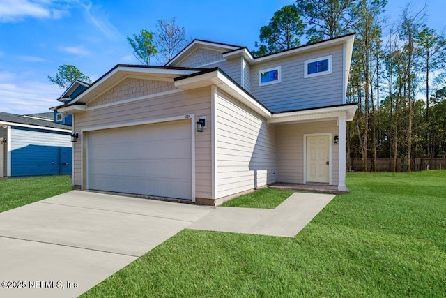 view of front facade featuring a front yard, concrete driveway, fence, and an attached garage