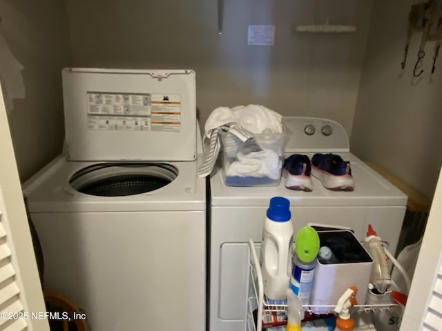 washroom with laundry area and washing machine and clothes dryer