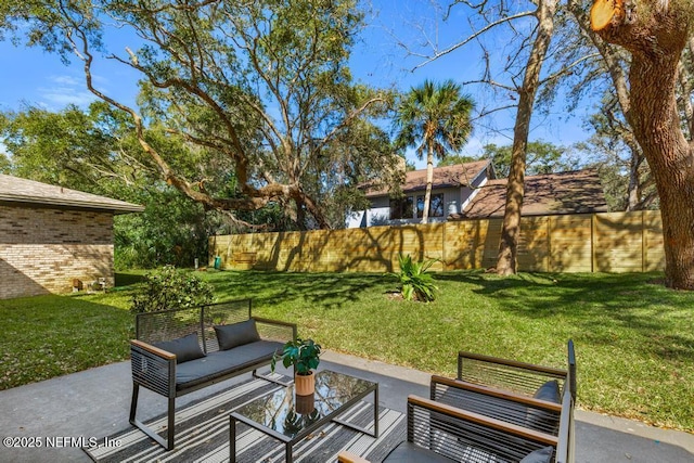 view of patio / terrace with fence and an outdoor hangout area