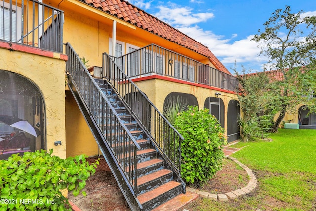 view of building exterior with stairs