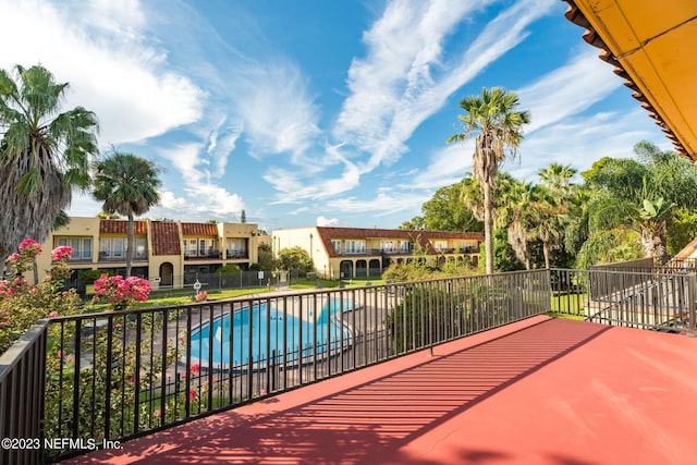 community pool with fence