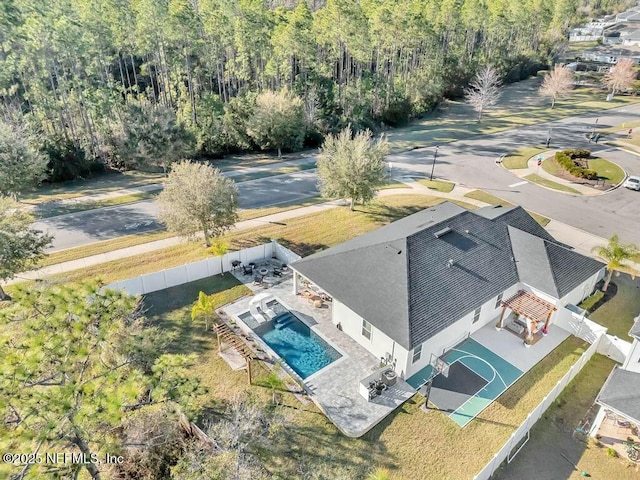 bird's eye view featuring a forest view