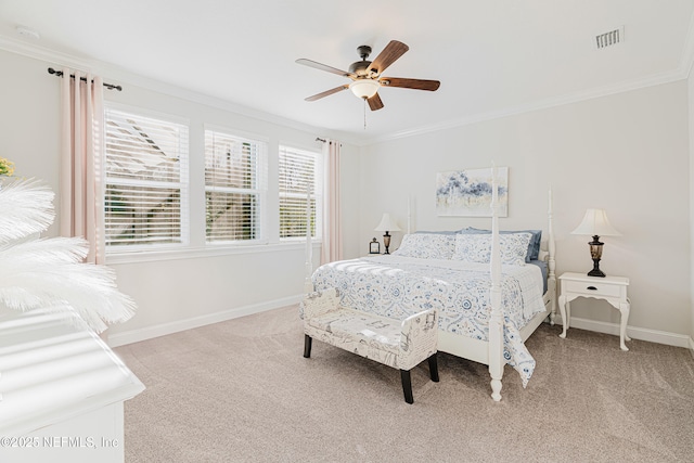 bedroom featuring visible vents, ornamental molding, baseboards, and light colored carpet