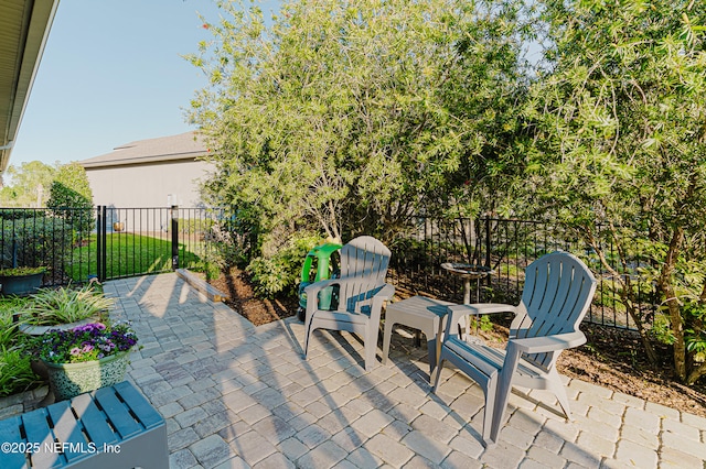 view of patio / terrace with fence