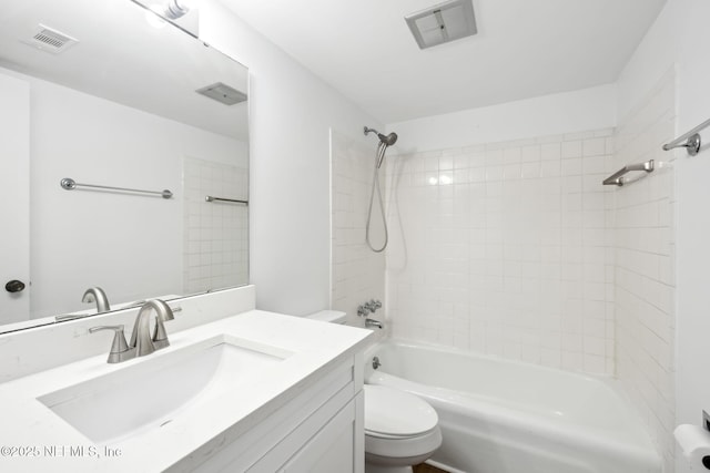 bathroom with toilet, visible vents,  shower combination, and vanity