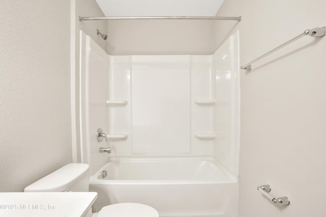 full bathroom with shower / bath combination, vanity, and toilet