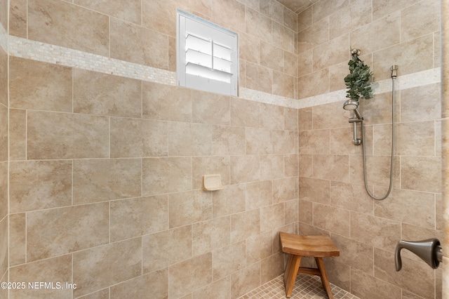 bathroom featuring tiled shower