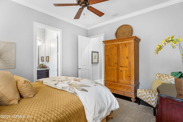 bedroom with a ceiling fan, ensuite bath, visible vents, and crown molding