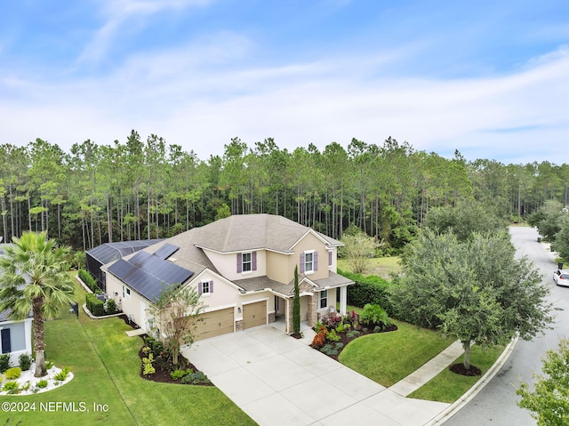 bird's eye view featuring a forest view