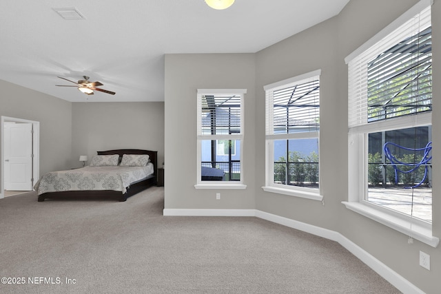 bedroom featuring visible vents, baseboards, and carpet flooring