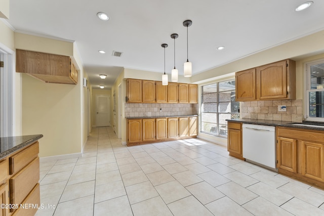 kitchen featuring decorative light fixtures, visible vents, backsplash, ornamental molding, and white dishwasher