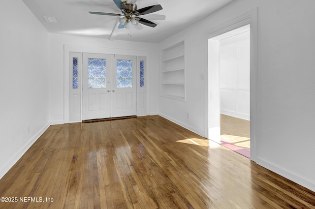 4804 Elizabeth Ter, Jacksonville, FL 32205 - entrance foyer with visible vents, ceiling fan, hardwood / wood-style flooring, and baseboards