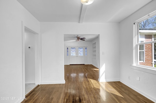 4804 Elizabeth Ter, Jacksonville, FL 32205 - interior space with built in features, beamed ceiling, baseboards, and wood finished floors