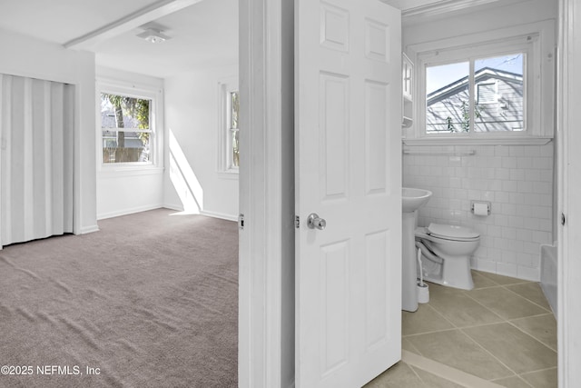 4804 Elizabeth Ter, Jacksonville, FL 32205 - bathroom with tile walls, toilet, and tile patterned floors