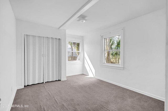 4804 Elizabeth Ter, Jacksonville, FL 32205 - spare room featuring carpet and baseboards
