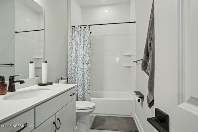 full bathroom with shower / bath combo with shower curtain, vanity, and toilet