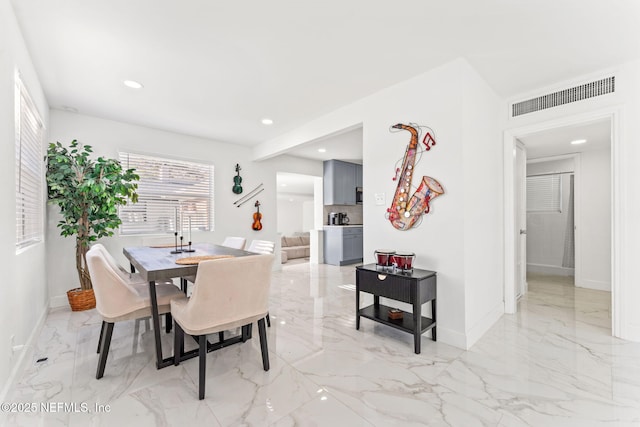 dining area featuring marble finish floor, baseboards, visible vents, and recessed lighting