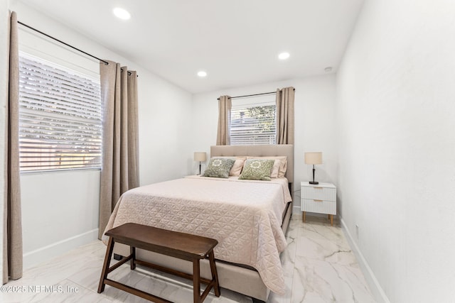 bedroom featuring marble finish floor, baseboards, and recessed lighting