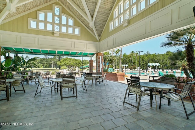 view of patio featuring a community pool