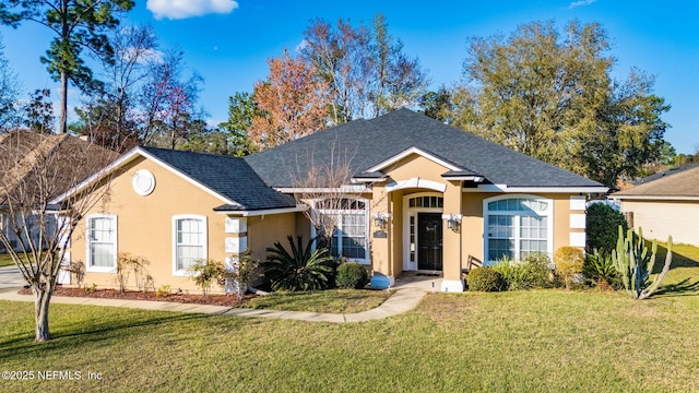 single story home with roof with shingles, a front lawn, and stucco siding