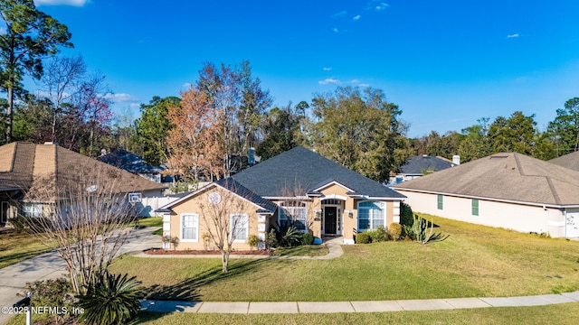 ranch-style home featuring concrete driveway, a front lawn, and stucco siding