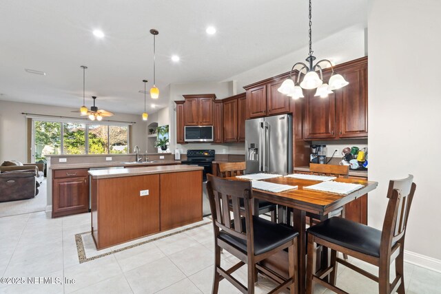 3077 Five Oaks Ln, Green Cove Springs, FL 32043 - kitchen featuring stainless steel appliances, ceiling fan, pendant lighting, a chandelier, and recessed lighting