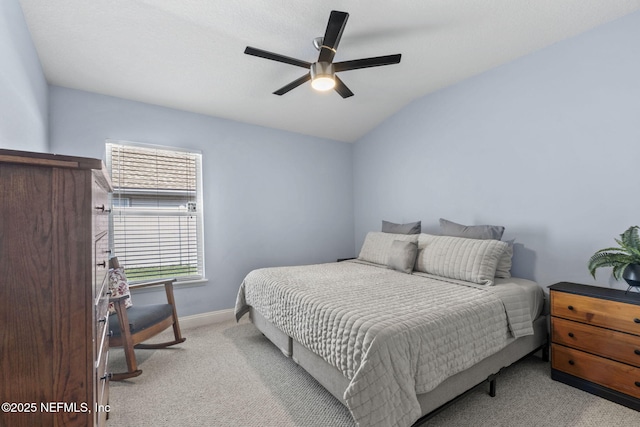 3077 Five Oaks Ln, Green Cove Springs, FL 32043 - carpeted bedroom with baseboards, ceiling fan, and vaulted ceiling