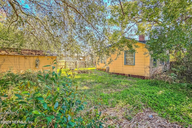 view of yard with fence