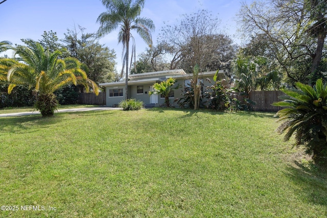 view of yard featuring fence