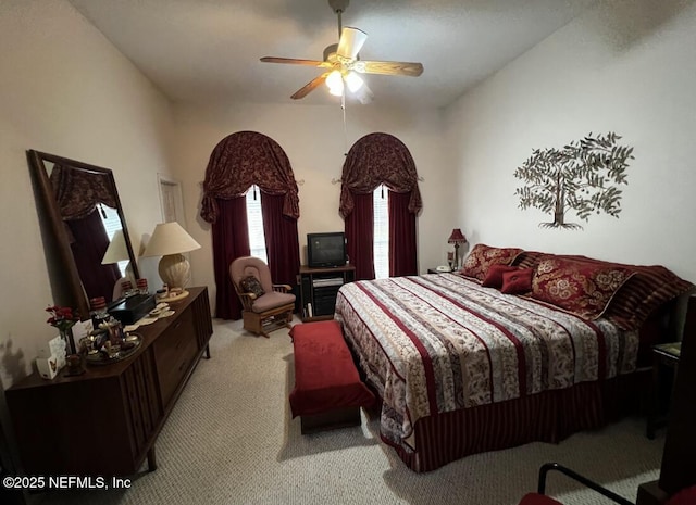 bedroom with carpet flooring and a ceiling fan