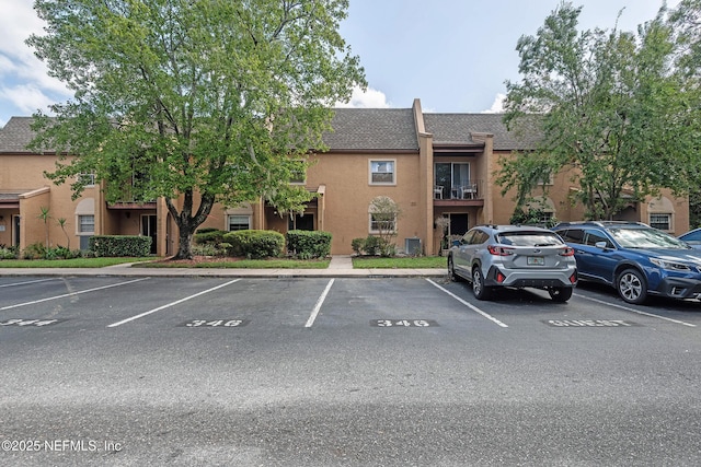 view of uncovered parking lot