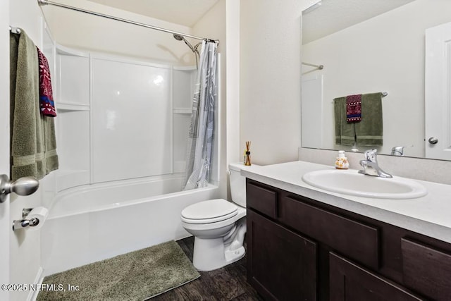 full bathroom featuring wood finished floors, vanity, toilet, and shower / bathtub combination with curtain