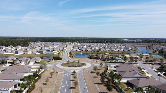 aerial view with a residential view and a water view