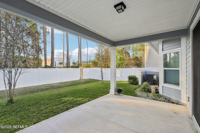 view of patio with a fenced backyard and central air condition unit