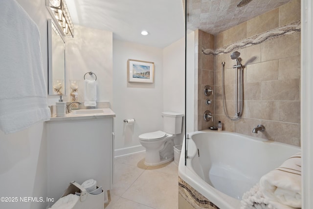 full bath with toilet, vanity, baseboards, tile patterned floors, and washtub / shower combination