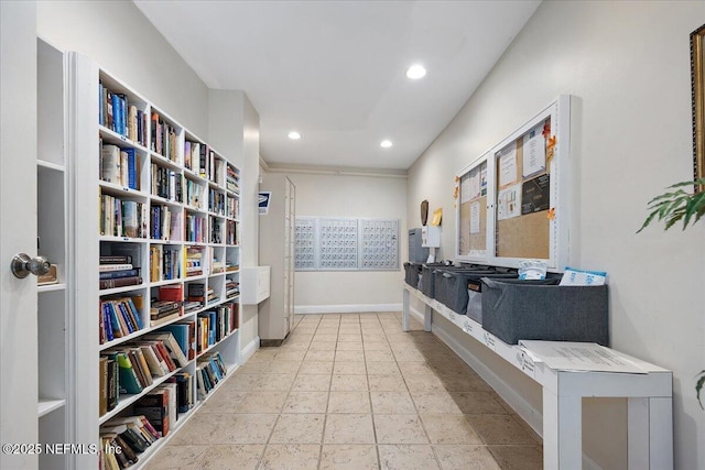 interior space with baseboards, tile patterned flooring, mail area, and recessed lighting