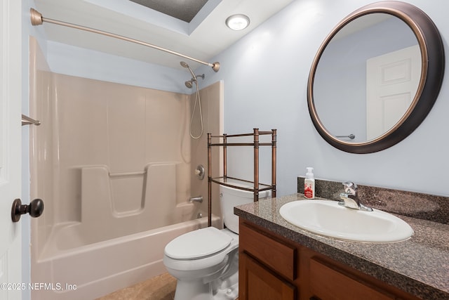 full bath featuring tub / shower combination, vanity, and toilet