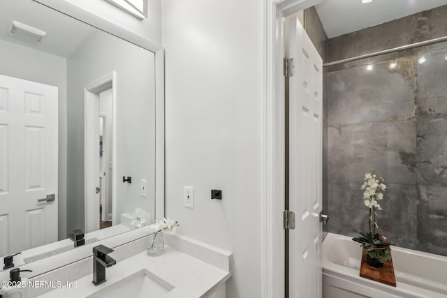 full bathroom with visible vents and vanity