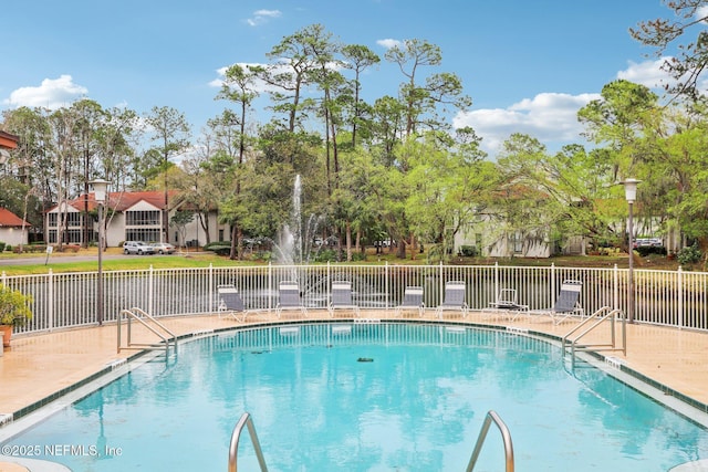 community pool with fence